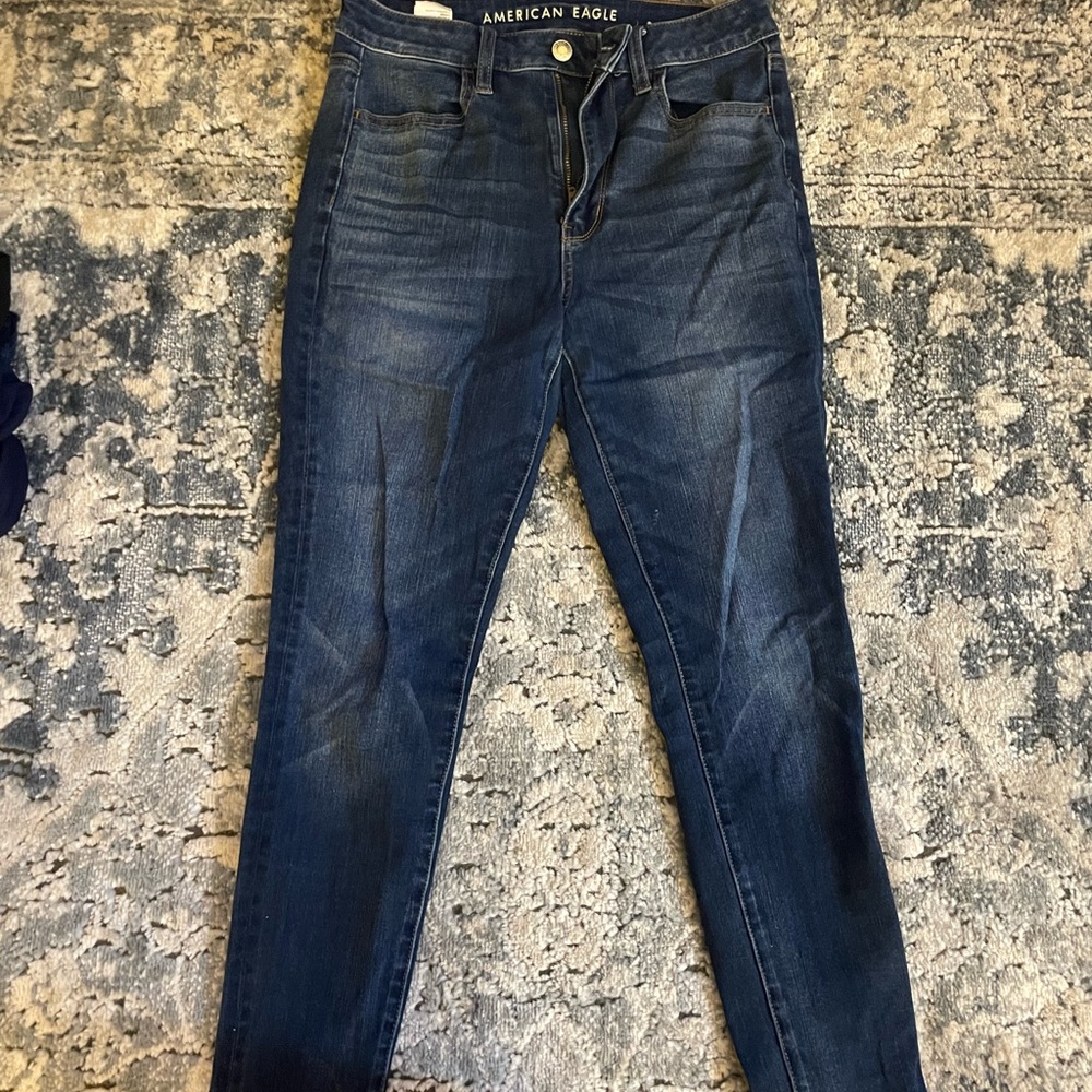 American Eagle dark-wash 360 stretch jegging.